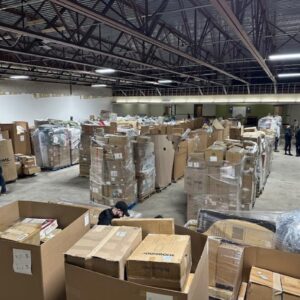 Wholesale liquidation pallets in warehouse — Vault Bridge Liquidators