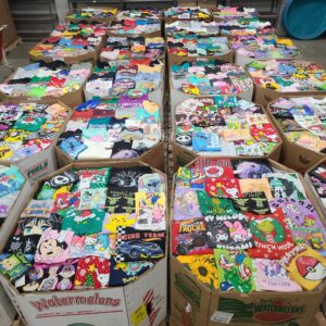 Licensed graphic tees pallet of 700 overstock and customer-return t-shirts ready for resale