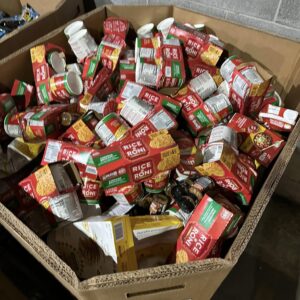 Amazon food truckload of 26 grocery liquidation pallets staged for reseller dispatch