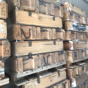 Wooden ammo crate truckload of stacked surplus wood ammunition crates on pallets ready for resale