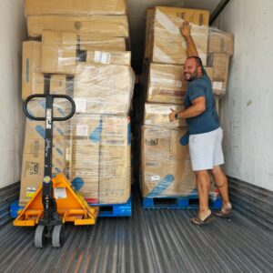 Furniwell Furniture Truckload Bin — Furniwell furniture truckload of boxed gaming and office chairs ready for resale