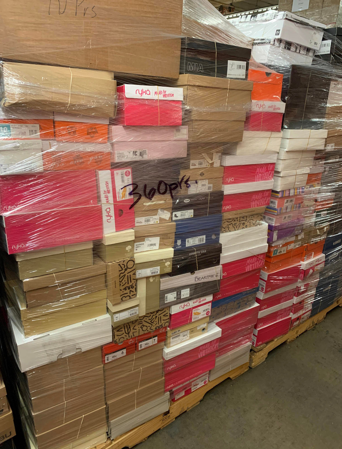 Nordstorm-Pallets Nordstrom liquidation truckload of designer apparel, shoes and handbags on 24 shrink-wrapped pallets
