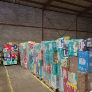 Bulk diaper truckload of shrink-wrapped overstock Pampers and Huggies diaper pallets ready for resale