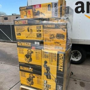DeWalt tools liquidation pallet stacked with drills, saws, batteries and combo kits for resale