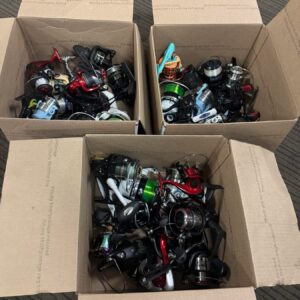 Fishing reel only pallet with 12 boxes of tested spinning and baitcasting reels for resale
