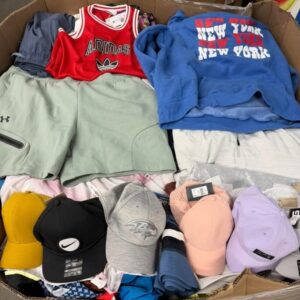 DSG clothing pallet of ~900 new-with-tags Dick's Sporting Goods athletic apparel pieces stacked for wholesale resale