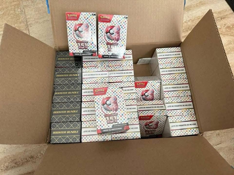 img_6418 Pokemon Cards Pallet 20 — Wholesale Pokemon cards pallet of 20 sealed booster boxes and loose TCG cards for resale