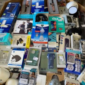 Wholesale electronics liquidation pallet stacked with mixed consumer-tech boxes ready for resale