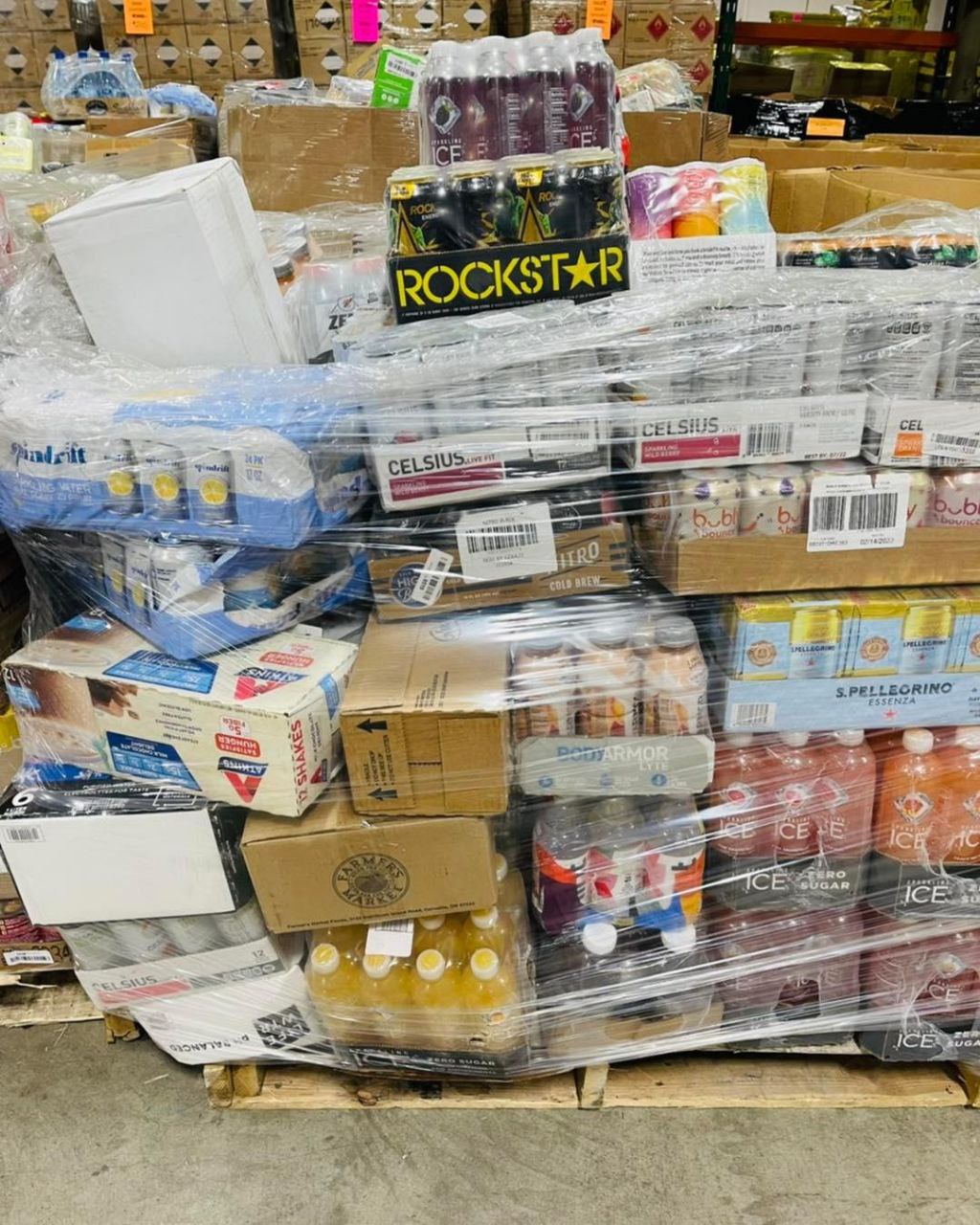 photo_2024-11-29_18-24-42 Mixed beverages wholesale pallet stacked with cases of soda, bottled water, juice and energy drinks