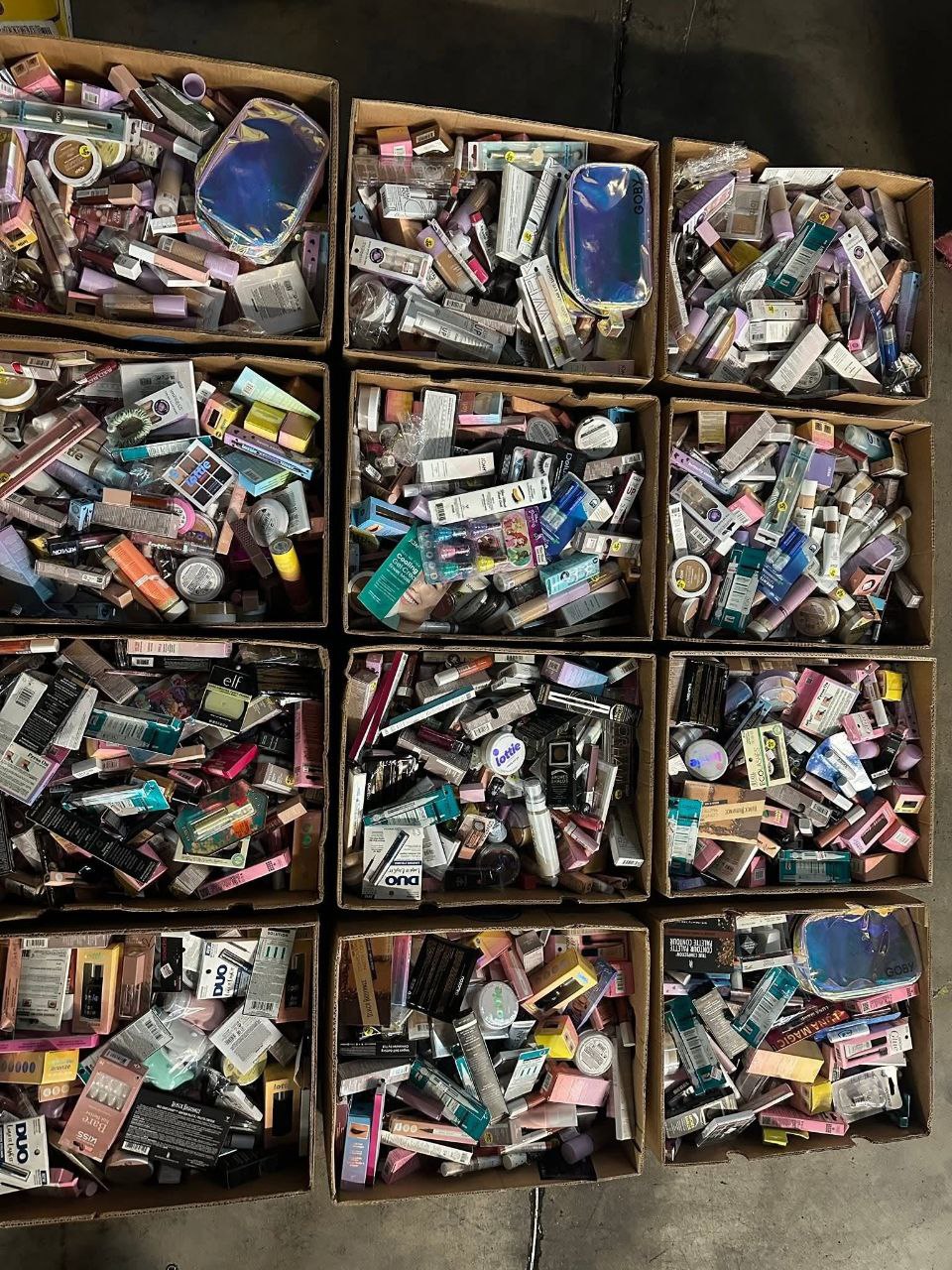 photo_2025-11-11_19-48-39-1 High end makeup liquidation pallet stacked with 200+ assorted prestige cosmetics and beauty shelf pulls