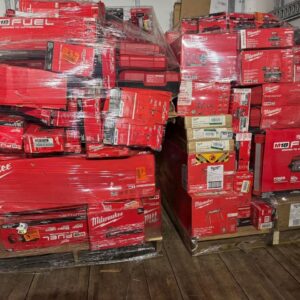 Milwaukee tool liquidation pallet stacked with M18 drills, batteries and PACKOUT cases