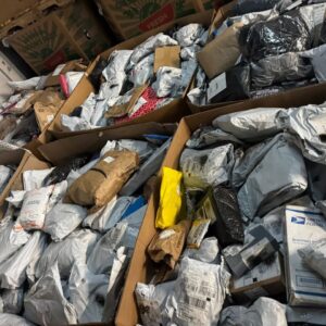300-item unclaimed mail pallet of mixed general merchandise wrapped for wholesale resale