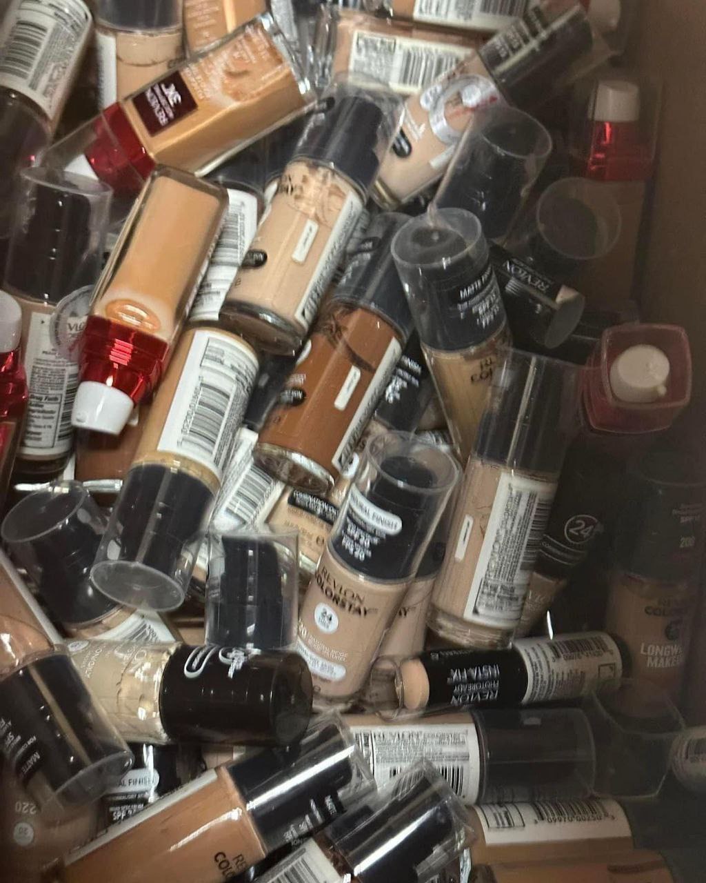 photo_6179457160484425878_y 100-unit mixed cosmetic pallet of brand-name makeup and skincare stacked for resale