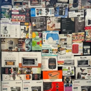 Wholesale liquidation pallets in warehouse — Vault Bridge Liquidators