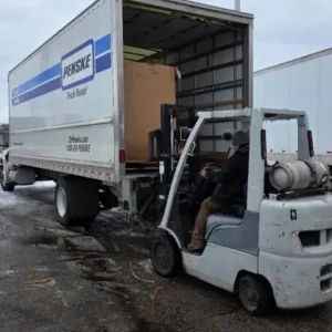 Wholesale liquidation pallets in warehouse — Vault Bridge Liquidators