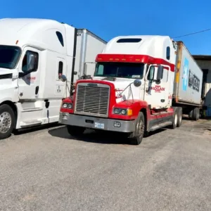 Wholesale liquidation pallets in warehouse — Vault Bridge Liquidators