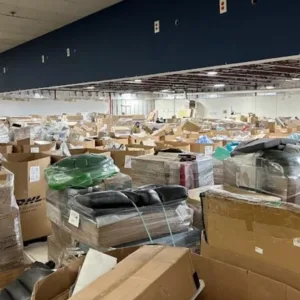 Wholesale liquidation pallets in warehouse — Vault Bridge Liquidators