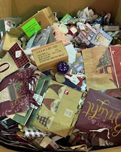 Dollar General Christmas pallet of new holiday and home goods stacked for resale