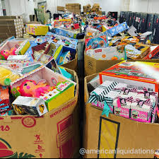 Wholesale toys liquidation pallet stacked with mixed kids' and baby resale merchandise