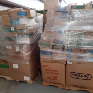 Dollar General liquidation pallet stacked with mixed health, beauty and general merchandise units for resale