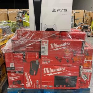 Wholesale tool liquidation pallet stacked with mixed power tools and electronics for resale