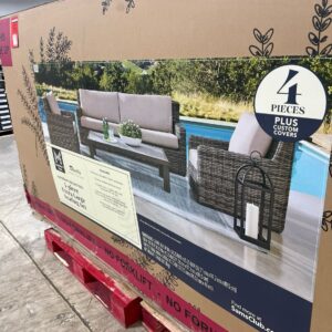 Member's Mark 4-Piece Seating Set with wicker sofa, two chairs, and coffee table