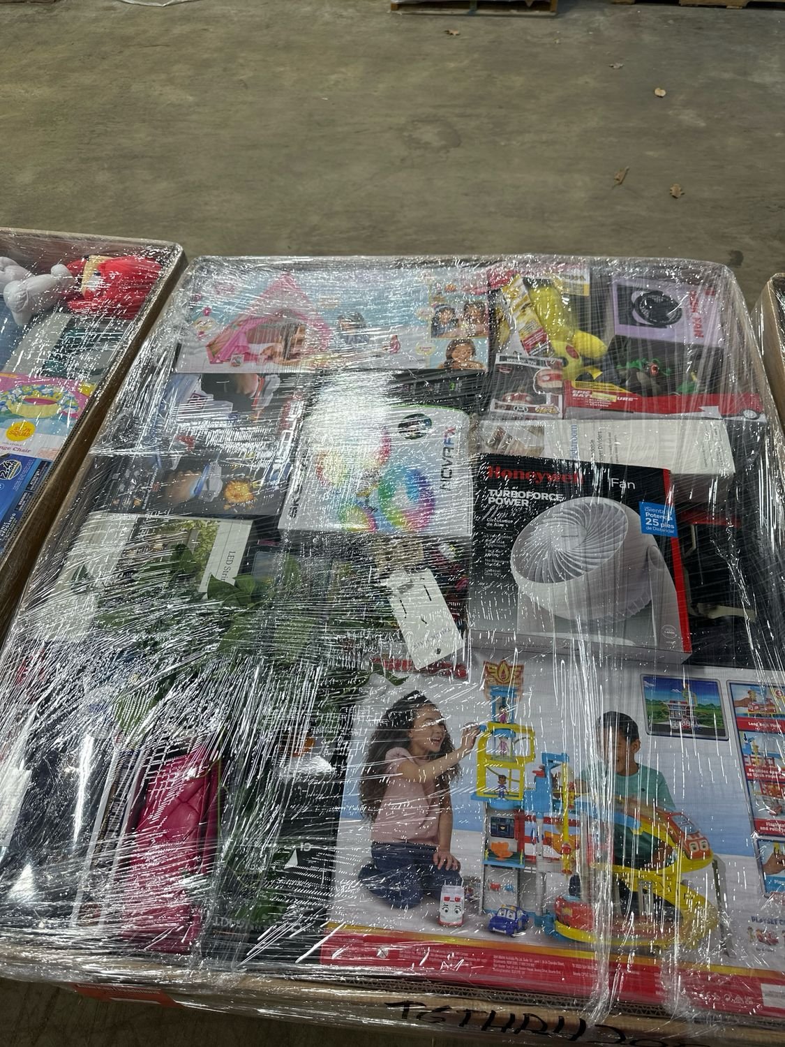TGTHP-4205 General Merchandise Liquidation Pallet 2 — General merchandise liquidation pallet stacked with mixed resale-ready overstock a