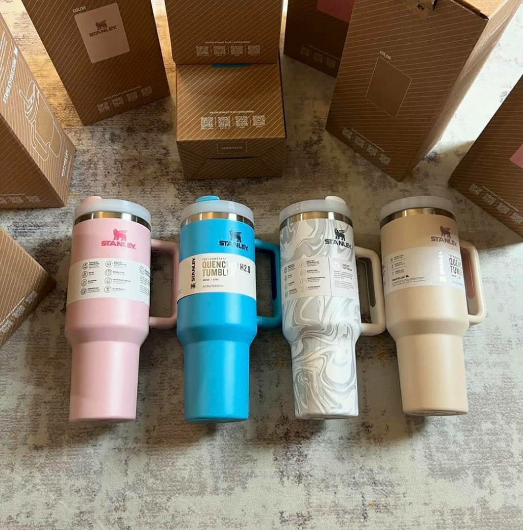 Stanley starbucks cups Stanley Starbucks cups pallet stacked with assorted insulated Quencher tumblers for resale