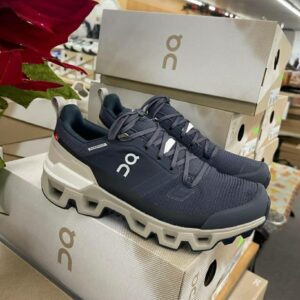 Cloud Nova shoe pallet of boxed On-style sneakers stacked for wholesale resale