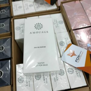 Assorted perfume liquidation pallet stacked with mixed designer and body fragrance boxes for resale