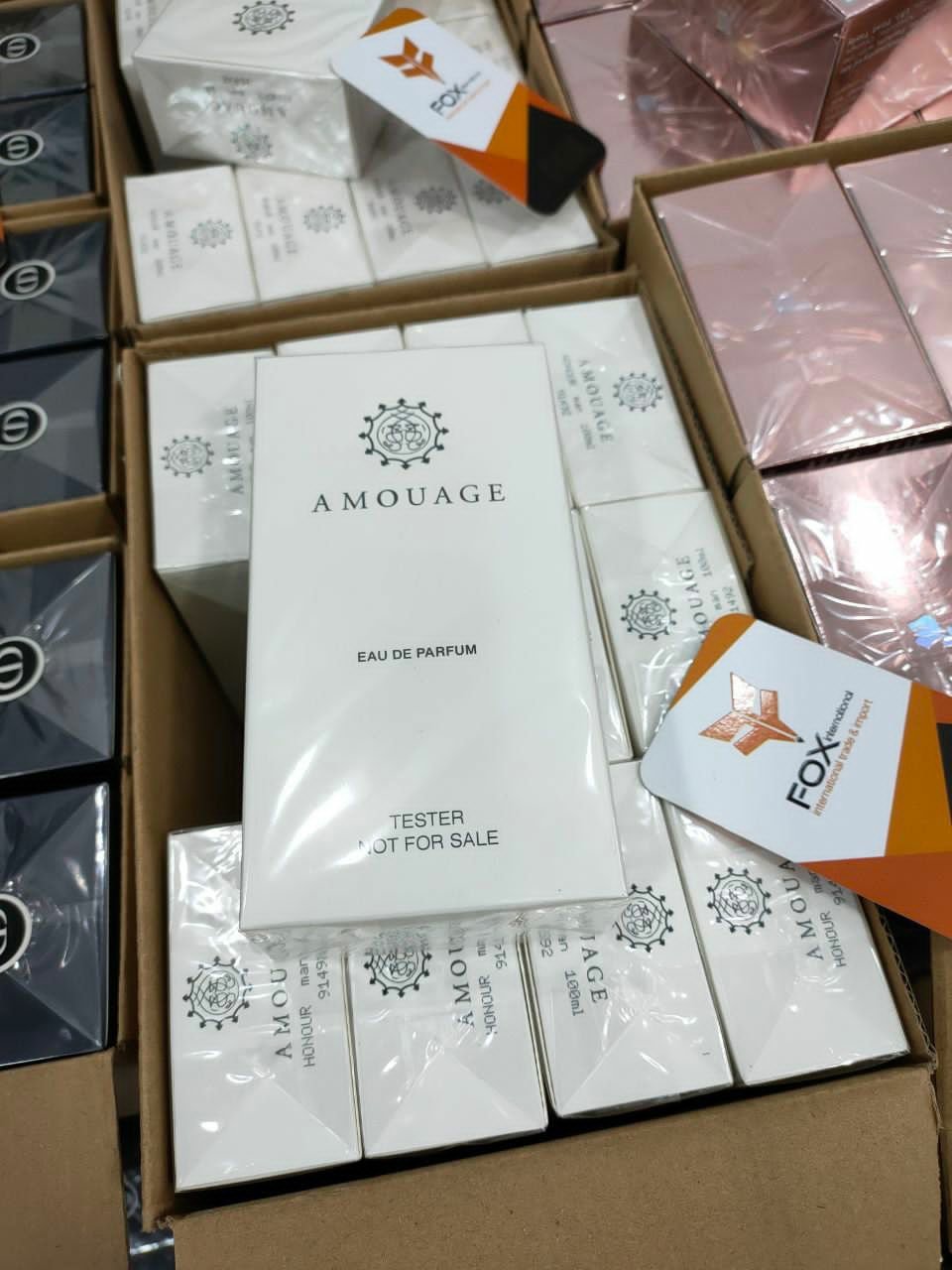 Assorted perfumes Assorted perfume liquidation pallet stacked with mixed designer and body fragrance boxes for resale