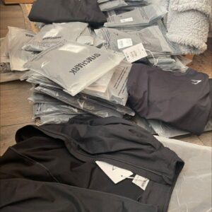 Wholesale Gymshark clothing pallet of authentic activewear leggings and joggers for resale