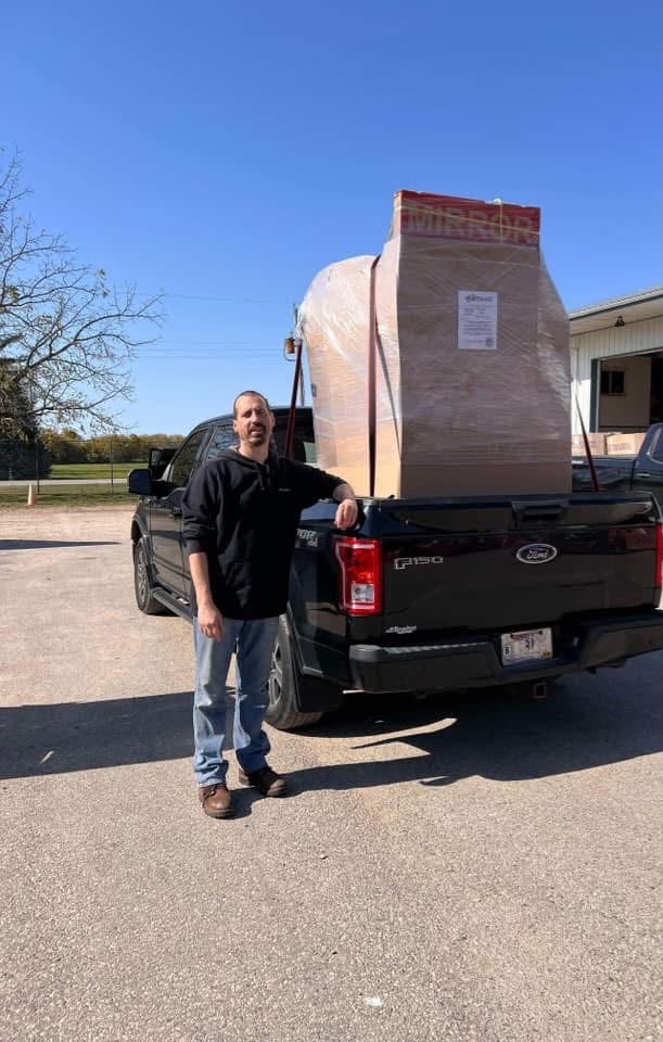 Customer pickup at Vault Bridge Liquidators