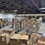 Wholesale liquidation pallets in warehouse — Vault Bridge Liquidators